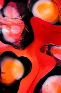 This striking abstract artwork features swirling patterns in vivid red, orange, and black tones,