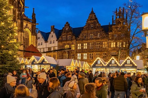 Christmas market Lichtermarkt St. Lamberti at dusk, Münster, North Rhine-Westphalia, Germany