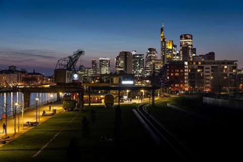 The lights of Frankfurt's banking skyline glow in the evening, Frankfurt am Main, Hesse, Germany