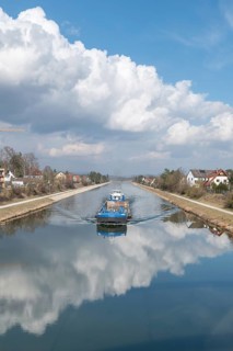 Cargo ship on the Main-Danube Canal, Möhrendorf, Bavaria, Germany