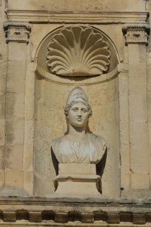 Stone sculpture and bust with shell, Ste-Anne church, Place de la République, Episcopal Palace,