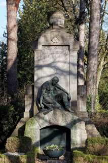 Historical tomb of the Blum family, miner sitting on a pit entrance, Melaten cemetery, Cologne,