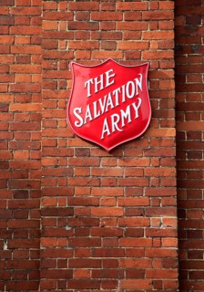 Salvation Army sign on brick wall, Andover, Hampshire, England, United Kingdom
