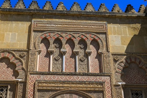 Cathedral Mosque of Córdoba, Mezquita-Cathedral, Façade with ornate arches and detailed patterns in