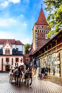 Florian's Gate with city wall and defensive towers, Krakow, Poland