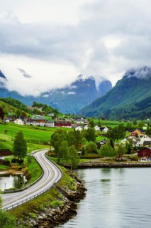 Mountains and Fjord over Norwegian Village, Olden, Innvikfjorden, Norway