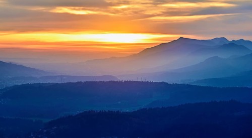 View of the Jura foothills from the Gisliflue, in the light of the setting sun, Talheim, Canton,