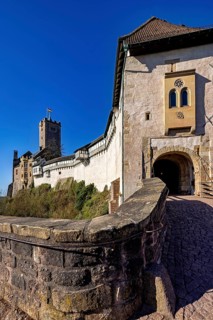 Entrance to a medieval castle with stone architecture, Wartburg Castle near Eisenach in Thuringia