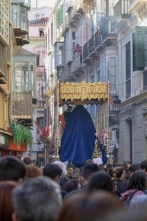 Good Friday procession, in a narrow alley, Malaga, Spain