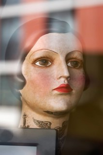 Woman's head from the 1920s in a show theatre of a tattoo studio, Erlangen, Middle Franconia,