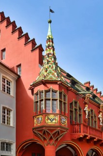 Freiburg, Germany, April 2022: Oriel window of red Historical Merchants' Hall building