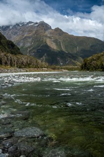 Landscape on Milford Sound with river and mountains. Cleddau River, Milford Sound, Fiordland