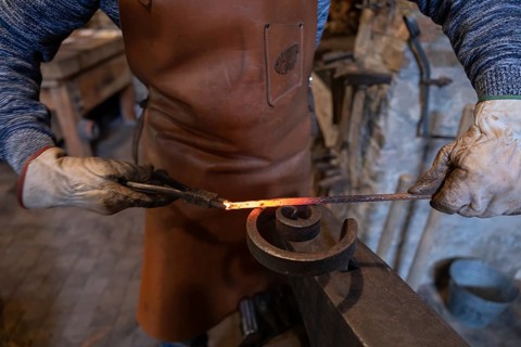 An elderly blacksmith in Salzburg, Austria, keeps centuries-old blacksmithing traditions alive in