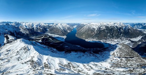 Aerial view, epic view of mountain landscape with snow in winter, summit of Bärenkopf, Achensee,