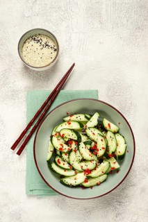 Chinese salad, cucumbers with chili pepper and sesame seeds, homemade, no people