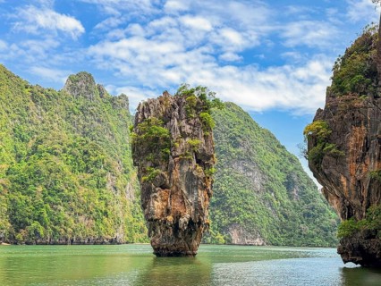 Breathtaking beauty of Phuket, Thailand, where lush limestone cliffs rise dramatically from emerald