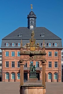Neustadt Town Hall with the Brothers Grimm National Monument seen through the market fountain,