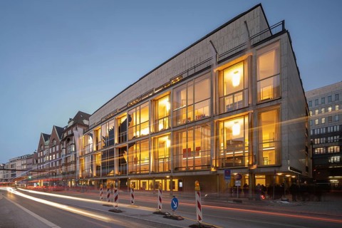 Hamburg State Opera (with Monster's Paradise façade) at blue hour with illuminated stripes of