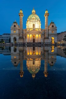 The baroque Karlskirche church at dusk, Vienna, Austria