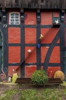 Chicken ladder as representation in front of a farmhouse, chicken, poultry, representation, gag,
