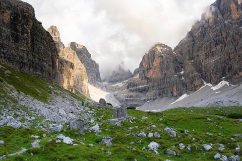 Cliffs and pinnacles in fog, Brenta Mountains, Brenta-Adamello Natural Park, Trentino, Italy