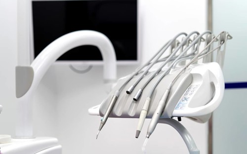 Close-up of advanced dental tools in a modern clinic, showcasing a range of instruments essential