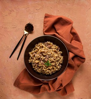 Pasta with stewed meat, pasta in the navy, horns, homemade, no people