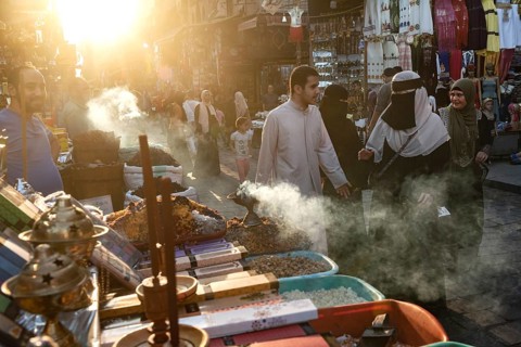 Cairo, Egypt. July 2nd 2024 Smoke from burning incense in a busy market in the historical Islamic