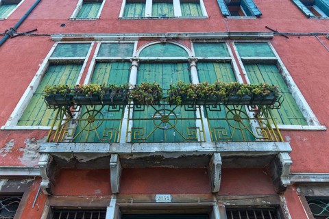 Balcony and closed shutters of an empty palace, Venice, Venice, Italy