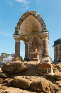 A stone historical monument with a view of the coast and blue sky, Monument, Oratory, Oratoire de