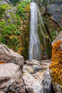 Detail of Grunas waterfall in Theth national park in summer, Albania. Albanian alps