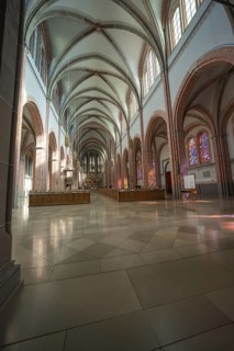 Spacious church interior with high ceilings and light effects on the walls, Sacred Heart of Jesus,
