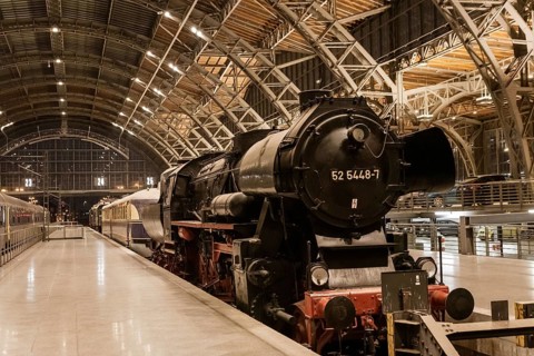 LEIPZIG, GERMANY - OCTOBER 8, 2018: Interior of the Leipzig Central Station with antique locomotive