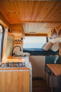 A perfect blend of travel and teleworking in a cozy camper. This mobile home features a compact