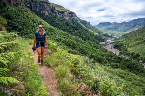 Female hiker on hiking trail, hiking to Tugela Gorge, Drakensberg National Park, KwaZulu Natal,