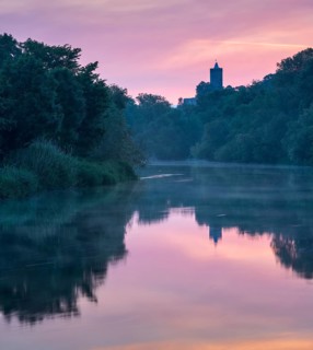 Sunrise on the Saale, the ruins of Schönburg Castle are reflected, Naumburg, Saxony-Anhalt, Germany