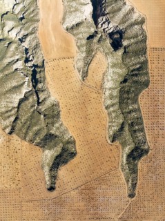 Canyons and gorges cut into the surrounding cultivated land, aerial view, drone shot, Gorafe