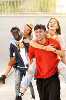 Happy multiracial friends having fun together. Soft focus. Concept of friendship with multicultural
