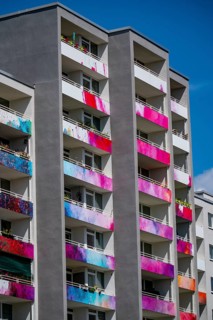 Newly designed façade, balconies, of a residential tower block in Essen-Steele Henglerstraße, after