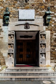 Portal with portraits from the Roman tomb of the Barbi family, San Giusto Cathedral, Colle di San
