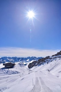 On the right the rock faces of the Hoher Ifen (2230 m) in Kleinwalsertal, on the left the mountain