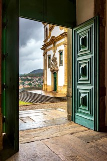 Baroque church seen through the door of another church in the city of Mariana, Minas Gerais