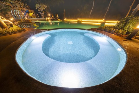 Illuminated swimming pool on Koh Chang Island, Andaman Sea, Southern Thailand, Thailand