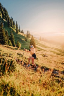 Summer trail running and hiking in the Alps on the Riedberg Pass between Obermaiselstein and