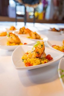 Dish with prawns and risotto on a heart-shaped plate, Europäischer Hof, Königsbach Stein, Germany