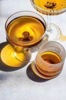 Georgian amber wine shines in crystal glasses, capturing the essence of traditional wine making.