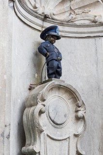Manneken Pis as policeman, boy, pee, fountain, attraction, disguised, statue, famous, tourism, city