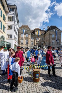 Historically costumed guild members in Zurich's old town, Zunft zur Meisen, Sechseläuten or