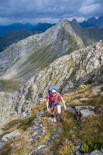 Hiker on the Carnic High Trail, ascent to the Raudenspitze, Carnic Main Ridge, Carnic Alps,