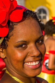 Portrait of colourful costumed, pretty woman. Carnival. Mindelo. Cabo Verde. Africa